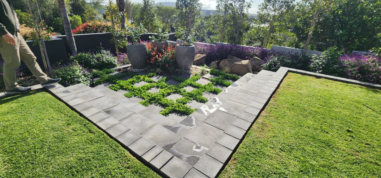 Sleek, low-maintenance paved patio area.